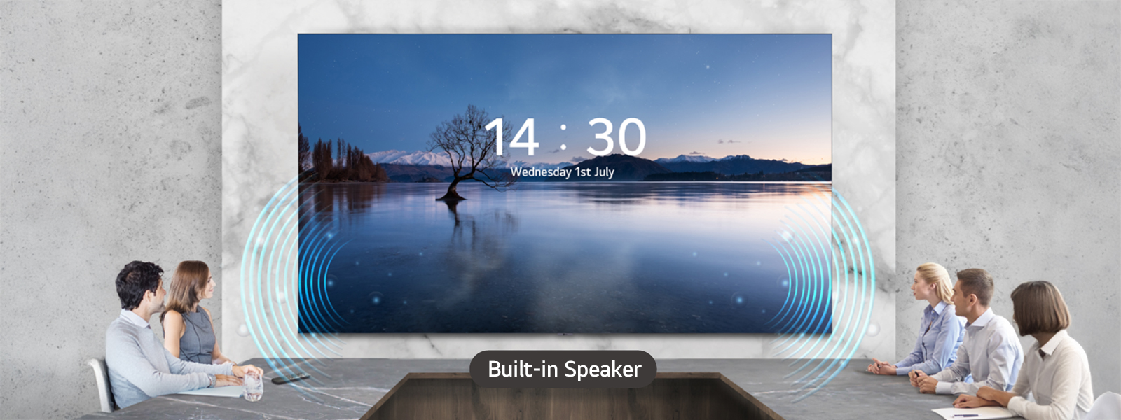 People have a meeting while watching the display and listening sound with the built-in speakers of LAAB, installed in the meeting room.